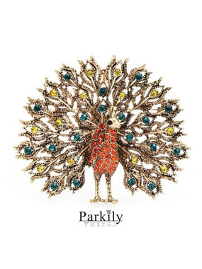 Brooch peacock in red with yellow and blue/green crystals in a gold tone pin